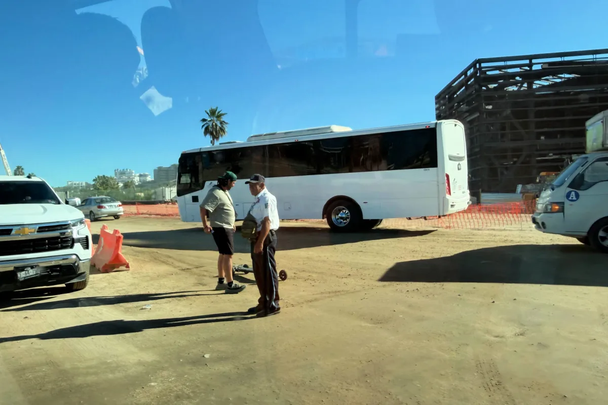 Official on duty at the FONATUR Roundabout Construction site on Oct 19 2025, turning toward the airport toll road.heic
