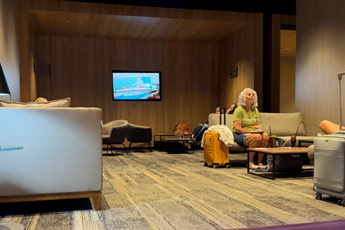 People sitting in the Los Cabos Airport VIP Lounge.HEIC