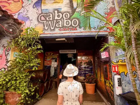 Woman walking into Cabo Wabo Cantina. Photo by Tyler Fox