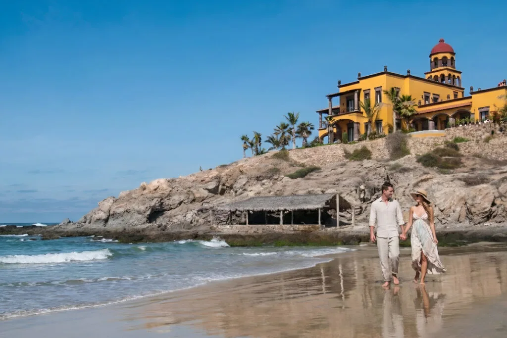 Los Cerritos Beach At Todos Santos Happy Couple walking along the beach