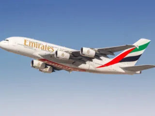 Emirates Airline plane in the air