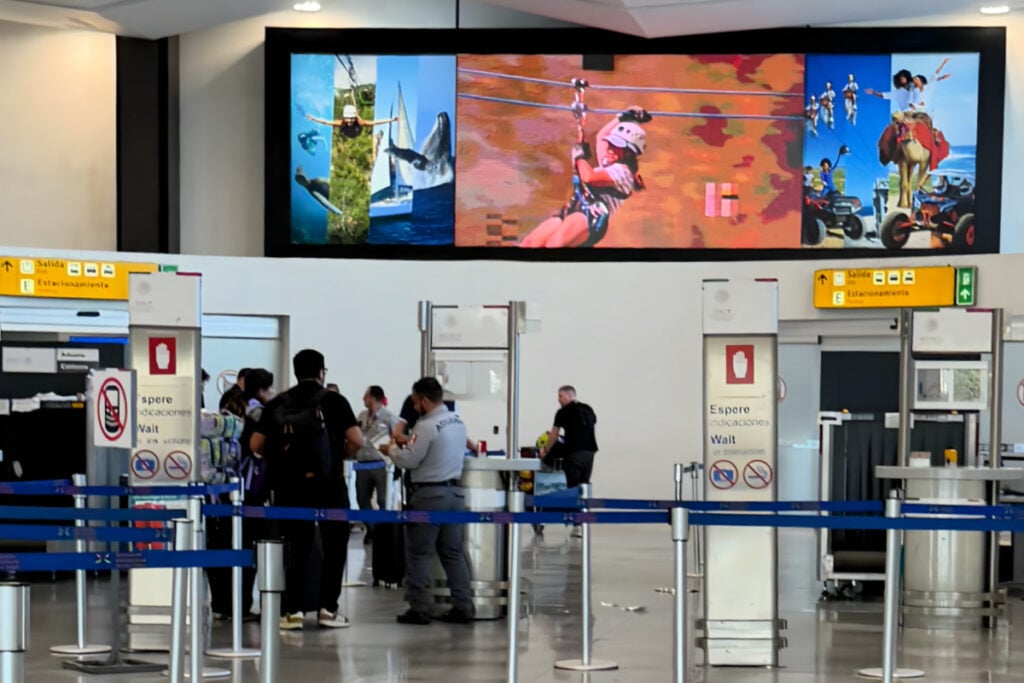 Los Cabos Airport Customs Area. Where Travelers press button "stoplight" to get red or green and proceed to shark tank area