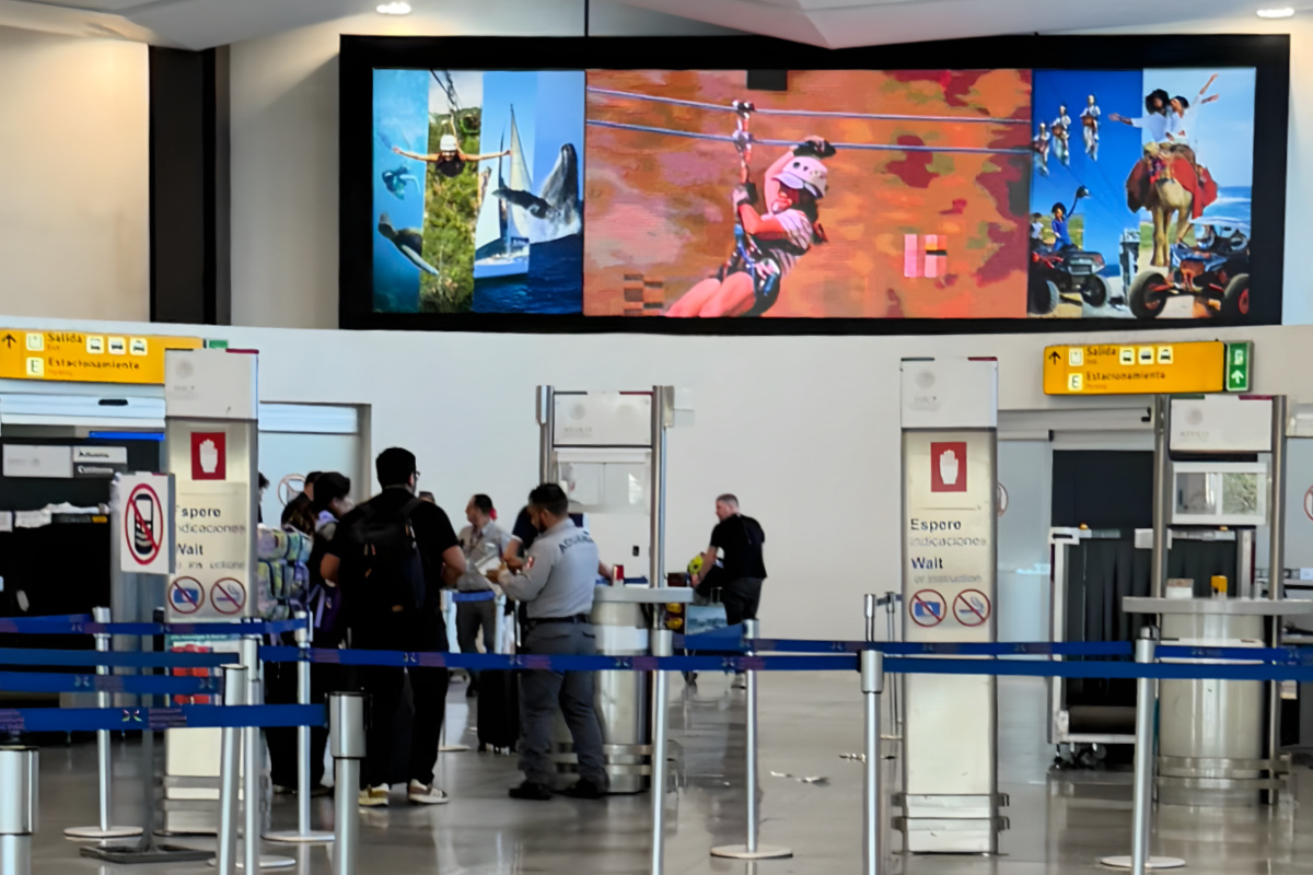 Los Cabos Airport Customs Area. Where Travelers press button "stoplight" to get red or green and proceed to shark tank area