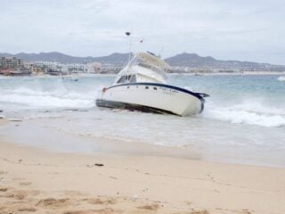 Travelers Shocked By Speed Boat Stranded On Cabo's Main Tourist Beach